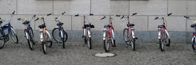 Bikes parked on the sidewalk